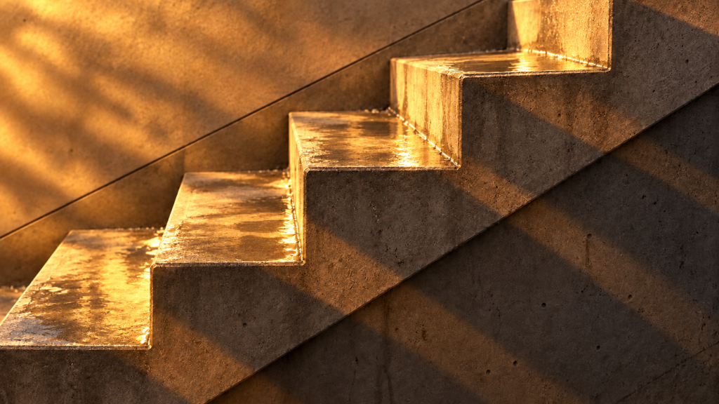 Concrete detail, after “Rain puddles reflecting the warm light on the concrete”