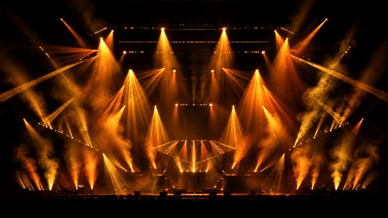 Stage lighting concept, after “Shift the beams from violet to warm amber tones”